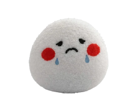 Pocket Egg frowning with a tear on each cheek